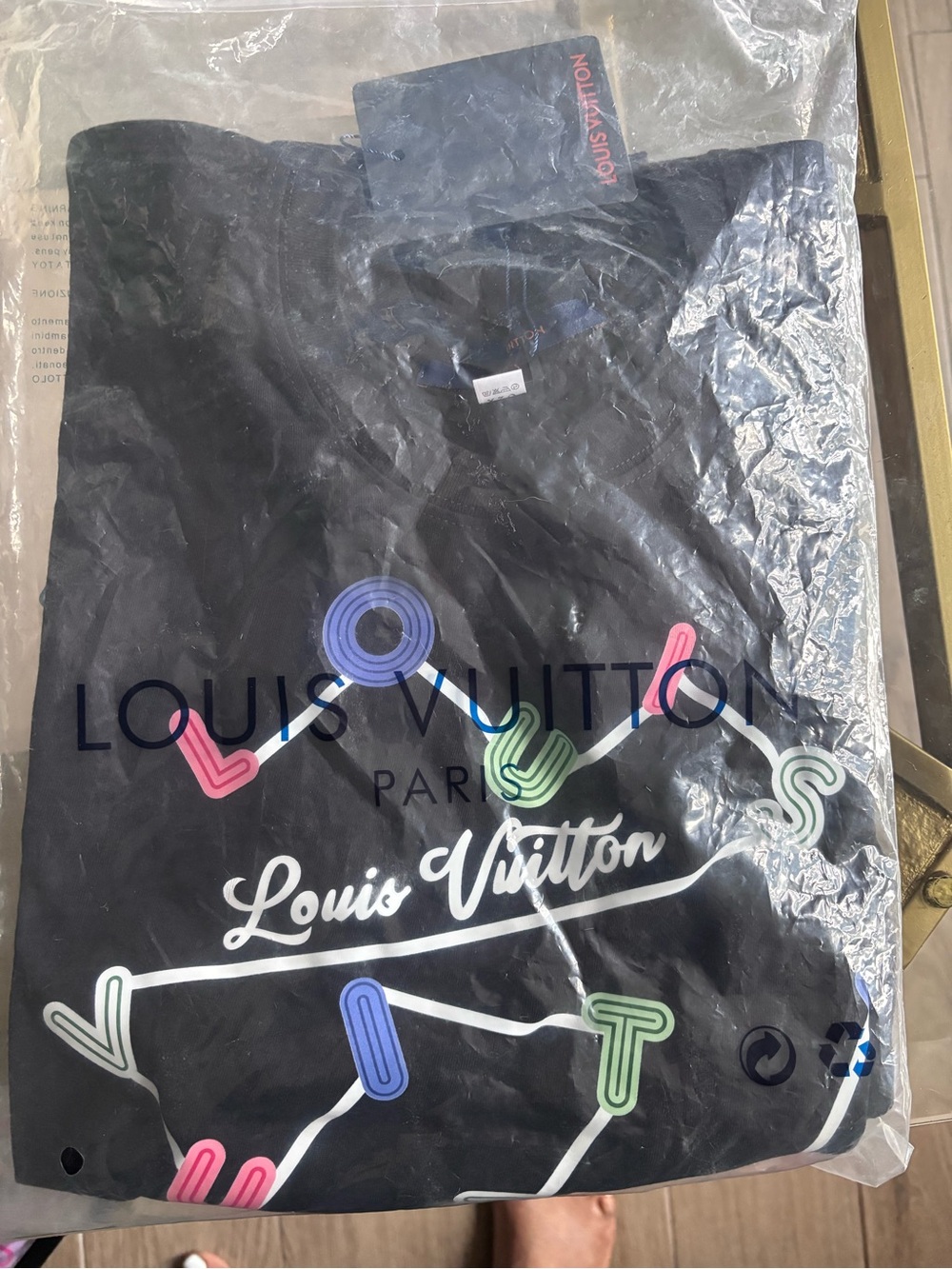 Black Logo Tee with Multicolor Neon Motif
